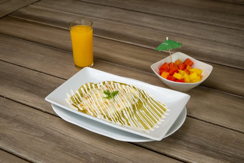 Chicken enchiladas verdes with green tomatillo sauce