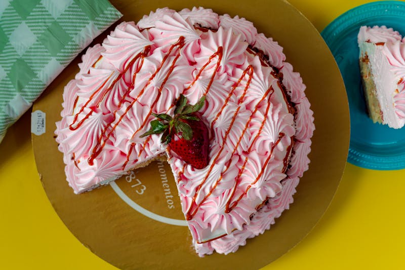 Tres leches cake with whipped cream topping
